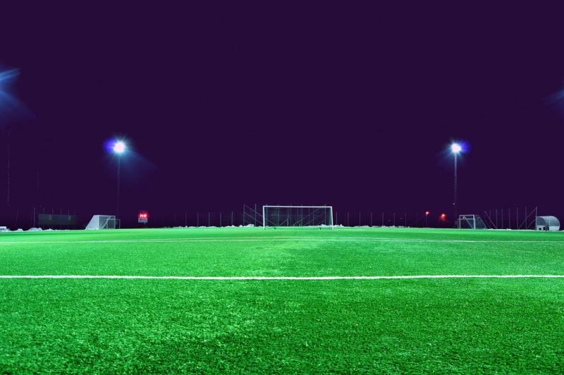 Floodlit artificial pitch at night