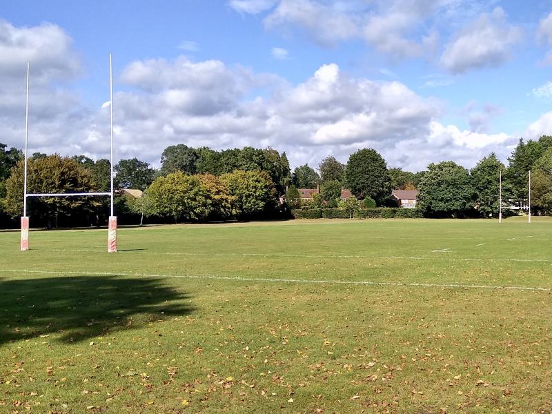 Rugby posts on a grass pitch