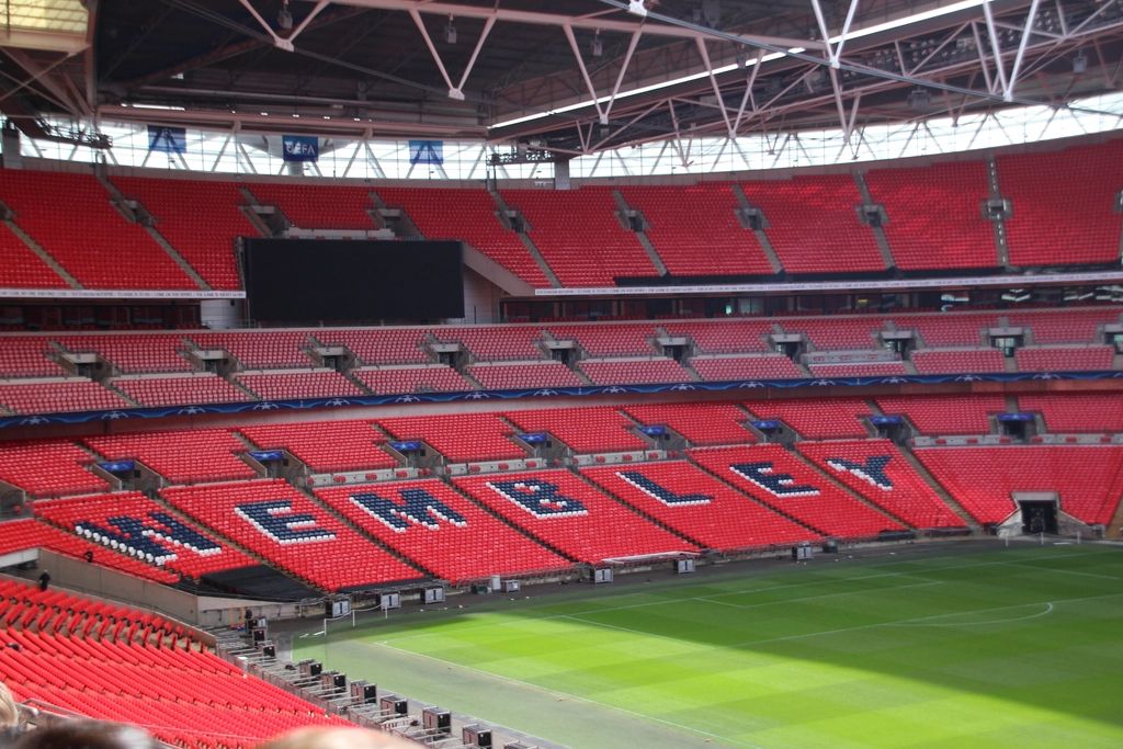 Empty red seats inside Wembley Stadium